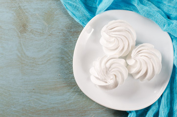 Fresh delicious white meringue cookies