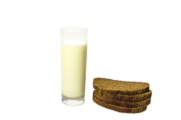 Milk in a glass fresh paired with sliced ??rye bread. Isolated on white background.