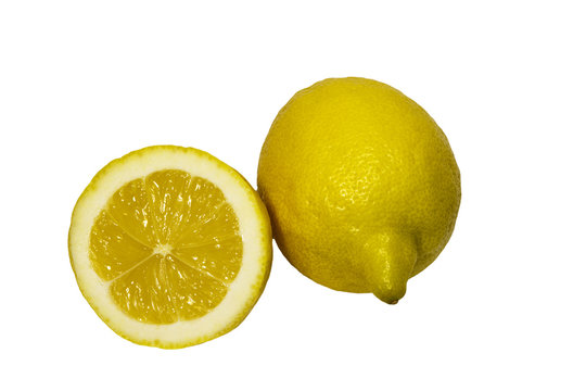 Lemon, whole and half isolated on white background.