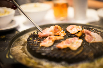 Bacon on the pan.