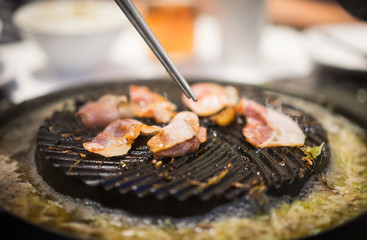 Bacon on the pan.