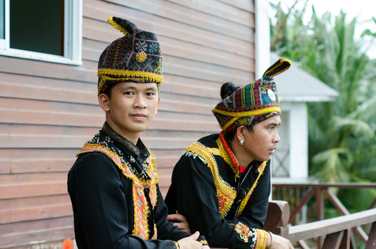 Young Men From Indigenous people of Sabah Borneo in East Malaysia in traditional attire during Musical and Dance Festival.