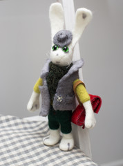 Toy rabbit in winter outfit