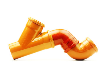 New orange drain pvc pipe isolated on white