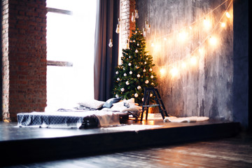 New Year's interior of a bedroom in loft style