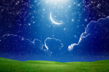 Crescent moon in dark blue starry sky, bright light beam from skies