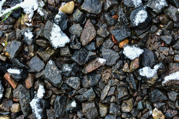 Stone beach in the snow, winter, frost, December