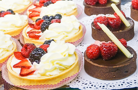 Fresh Fruit Tarts and Chocolate Tortes in Bakery
