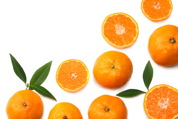 mandarin with slices and green leaf isolated on white background top view