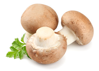 Fresh champignon mushrooms with parsley isolated on white background