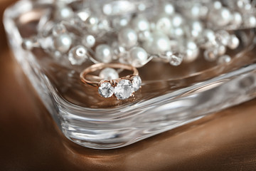 Beautiful engagement ring with jewellery, closeup