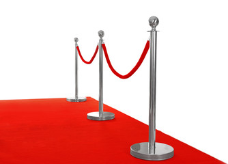Red carpet with rope barrier, isolated on white