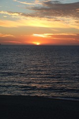 Sun is going down at Indian Ocean in Cottesloe Beach, Western Australia 