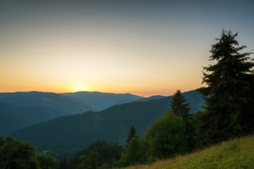 Fototapeta na wymiar Panoramic view of colorful sunrise in mountains.