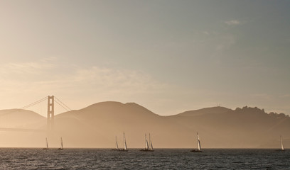 Golden Gate bridge and sailers