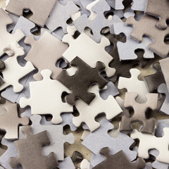 Abstract background. Folding and scattered jigsaw puzzle without a pattern of different colors....