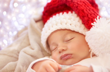 Fototapeta na wymiar Little baby sleeping on Christmas