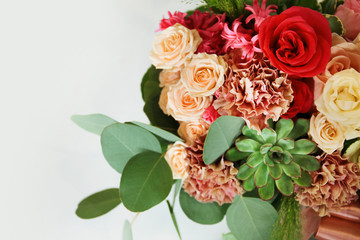 Beautiful bouquet of blooming flowers on white background