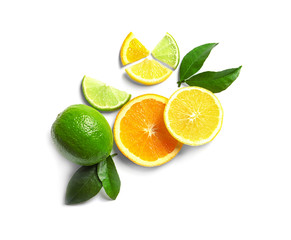 Composition with lemon, lime and orange slices on white background