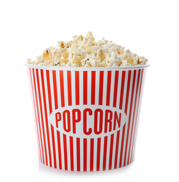Cup with popcorn on white background