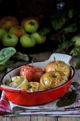 Baked apples in metal form