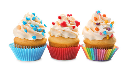 Tasty cupcakes on white background