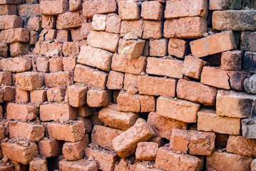 A traditional homemade oven for brickmaking in rural Uganda. The wet molded clay is stacked after which a fire is lit to bake the units ready for construction works