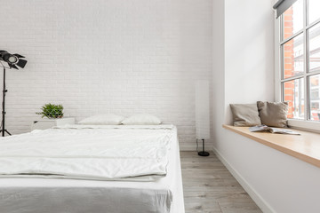 Brick wall in bedroom