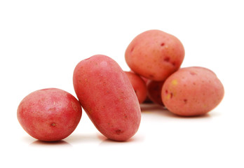 red potatoes on white background