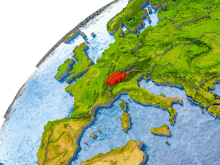 Map of Switzerland in red on globe