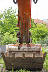 Fototapeta na wymiar Old scraped excavator bucket
