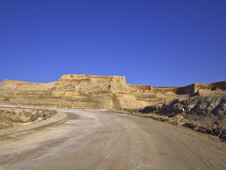 Open-pit lignite mine where brown coal is mined for combustion.