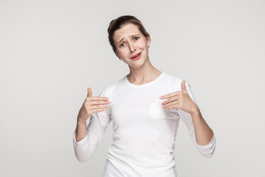 Puffy Funny Woman Pointing Hands Himself And Looking At Camera.