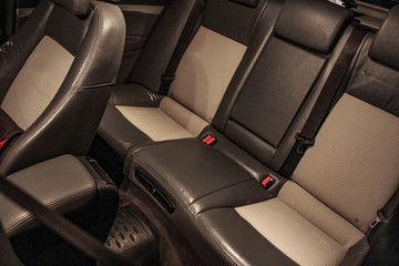 Salon of a car, parts from leather and plastic