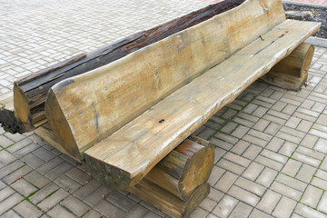 Old wooden bench in the brutal style.
