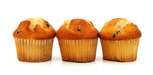 Fresh chocolate chip muffin close up.