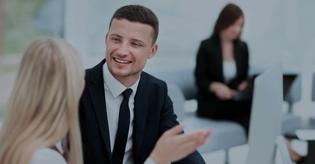 Businesspeople  Having Meeting In Office