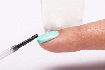 Manicure. Master make nail extension. Finger closeup