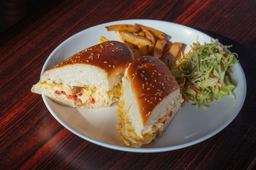 Close up club sandwich on wooden table, delicious meal breakfast.