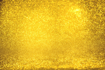 golden glitter texture Colorfull Blurred abstract background for birthday, anniversary, wedding, new year eve or Christmas.