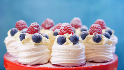 Australian mini pavlovas and flags in red, white and blue for Australia Day or national holiday party food treats.