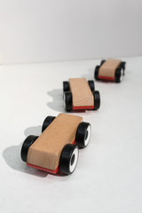 wooden toy cars isolated on white background