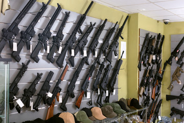 Rifle kalashnikov hangs on the wall