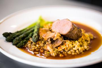 Tasty meat dish with asparagus