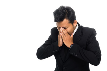 Portrait of a business man is sneeze. Isolated on white background