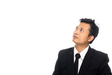 Portrait of a business man thinking with suit. Isolated on white background
