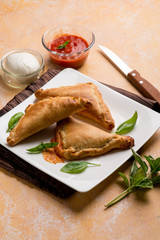 panzerotti with tomato and mozzarella