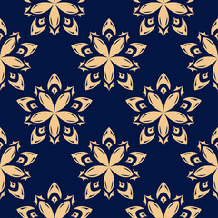 Fototapeta premium Golden floral element on dark blue background. Seamless pattern