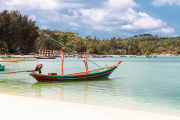 Naklejka na ściany i meble Fisherman boat parked at Thong Nai Pan Yai beach, Paradise, Malibu or Bottle beach in Chaloklum, Koh Phangan, Thailand