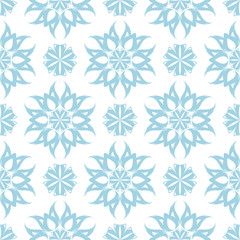 Blue floral ornament on white background. Seamless pattern